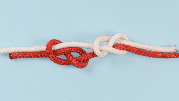 A white and a red rope interconnected